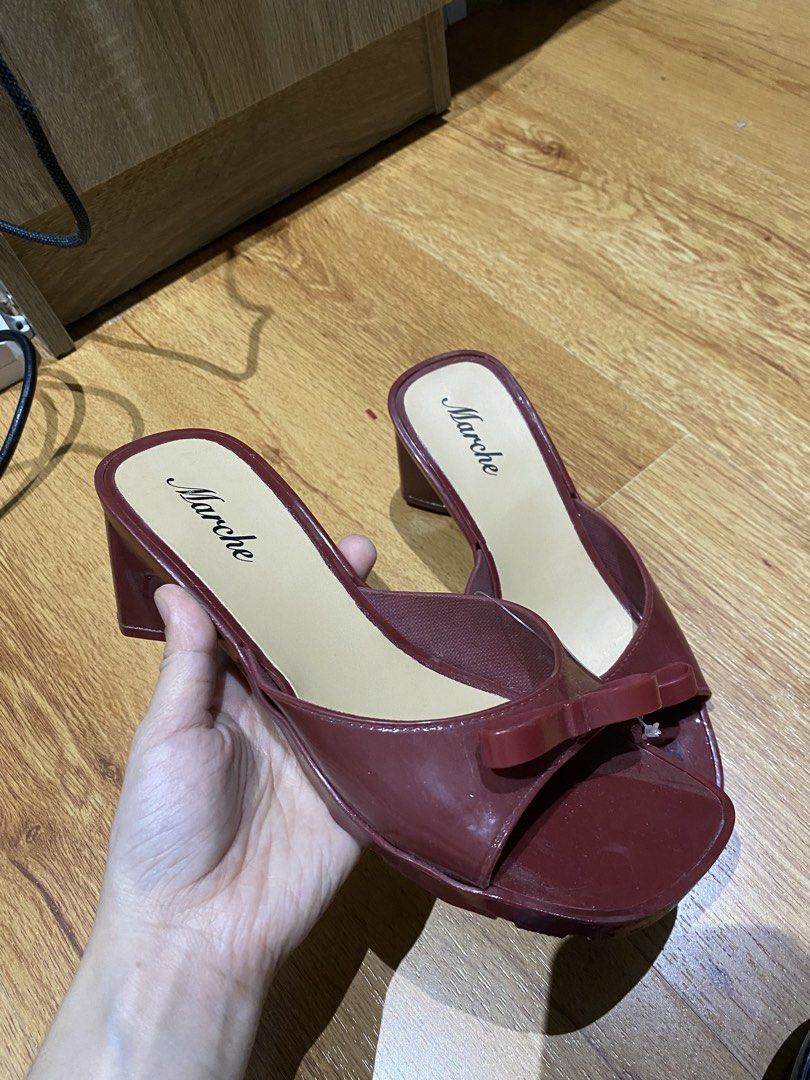 Marche Red Bow Block Heels Size 37 (Category: Heels) located in Manila. Submitted by mpt99876 (Listing ID 1467349798, Image 3). Description: - Brand: Marche - Color: Dark red with a glossy finish - Size: 37 - Style: Open-toe slip-on heels with a cute bow accent - Heel: Stable and comfortable chunky heel for easy walking - Condition: Great for everyday wear or special occasions.