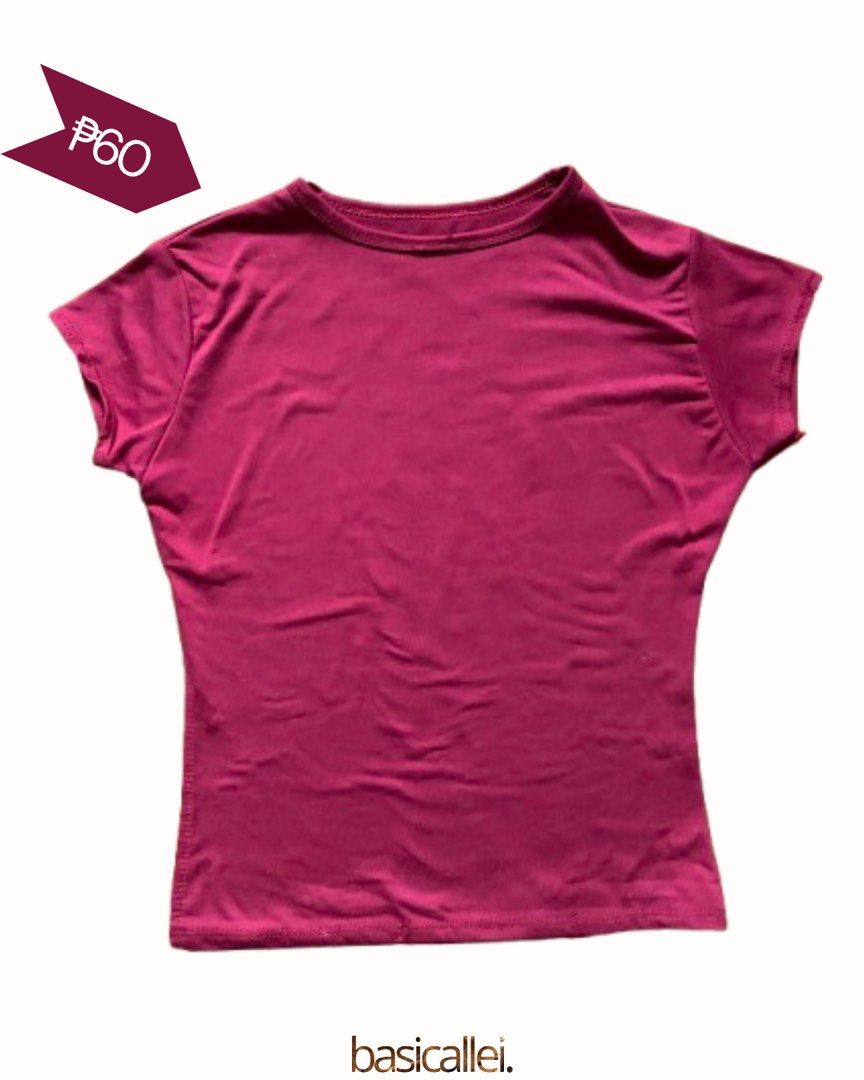 Maroon Top (Category: Shirts) located in Quezon City. Submitted by basicallei (Listing ID 1467237496, Image 1). Description: Maroon body-hugging double-lined crop top Fits size XS-M (Body in photo is M) Minimal issue: Loose thread.