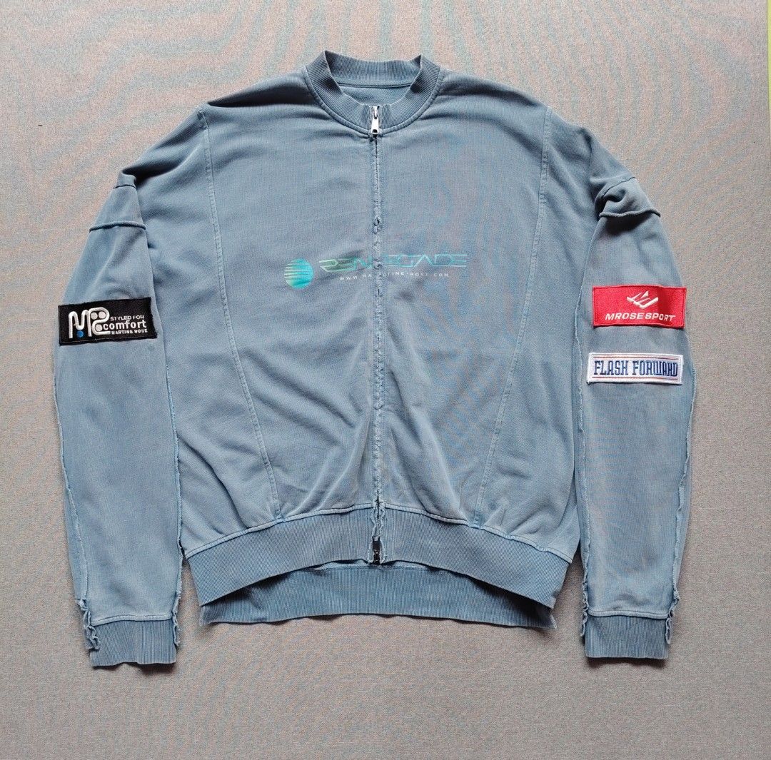 Martine Rose Renegade Zip Up Crew (Category: Coats, Jackets and Outerwear) located in Taguig. Submitted by _theroom.ph (Listing ID 1467197725, Image 2). Description: - Brand: Martine Rose - Color: Washed blue - Closure: Full front zipper with ribbed collar, cuffs, and hem - Design: Printed graphics on the chest and embroidered patches on both sleeves - Details: Trendy exposed seam construction Martine Rose Zip-Up Panelled Sweatshirt (Featuring A 