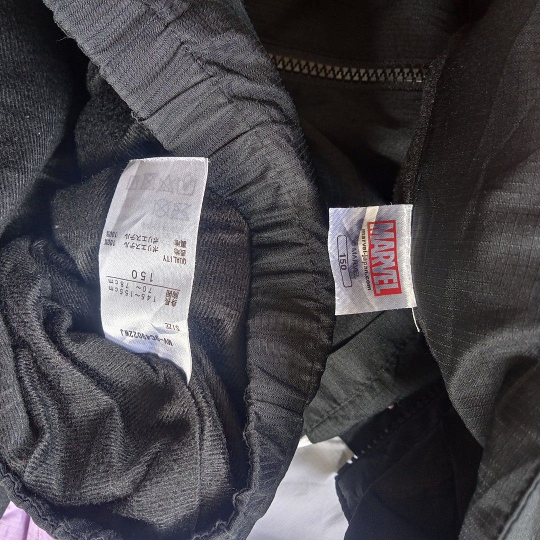 Marvel Black White Purple Colorblock Zip Jacket Size 150 (Category: Coats, Jackets and Outerwear) located in Baguio. Submitted by miishaysh67446 (Listing ID 1467357139, Image 2). Description: - Authentic Marvel branding on the chest and sleeve - Trendy black, white, and purple colorblock design - Tagged size 150 (fits kids/teens) - Full zipper closure with convenient front pockets - Elastic cuffs and hem for a snug, comfortable fit - Condition: E