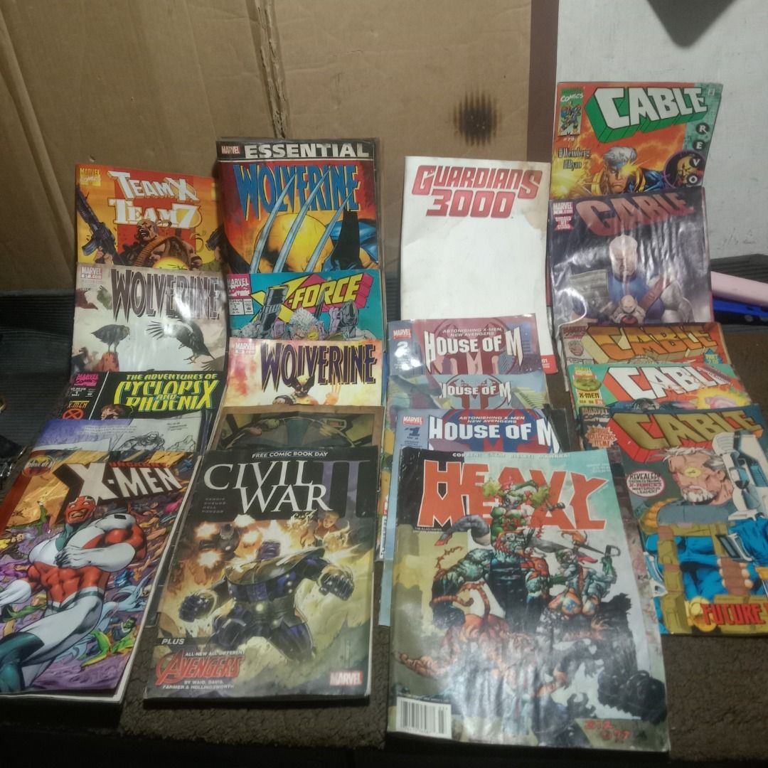 Marvel Comic Books Bundle X-Men Wolverine Cable (Category: Comics & Manga) located in Manila. Submitted by louiebox05 (Listing ID 1467267483, Image 1). Description: - Lot of various Marvel comic books sold together - Includes titles: X-Men, Wolverine, Cable, House of M, Civil War II, and Heavy Metal - Features multiple issues across the stack - Condition: Shows edge wear and creases from reading and storage - Perfect for collectors looking for cl