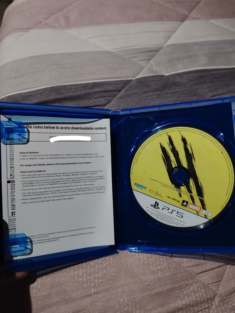 Marvel Wolverine PS5 Game Disc (Category: PlayStation) located in Manila. Submitted by mrtn1028 (Listing ID 1467247330, Image 3). Description: - Game: Marvel Wolverine for PlayStation 5 - Condition: Disc is clean and 100% scratch-free, tested and working perfectly - Inclusions: Original case, game disc, insert booklet, and voucher code slip - Region: Asia (R3) - Trusted seller with fast shipping and secure packaging!.