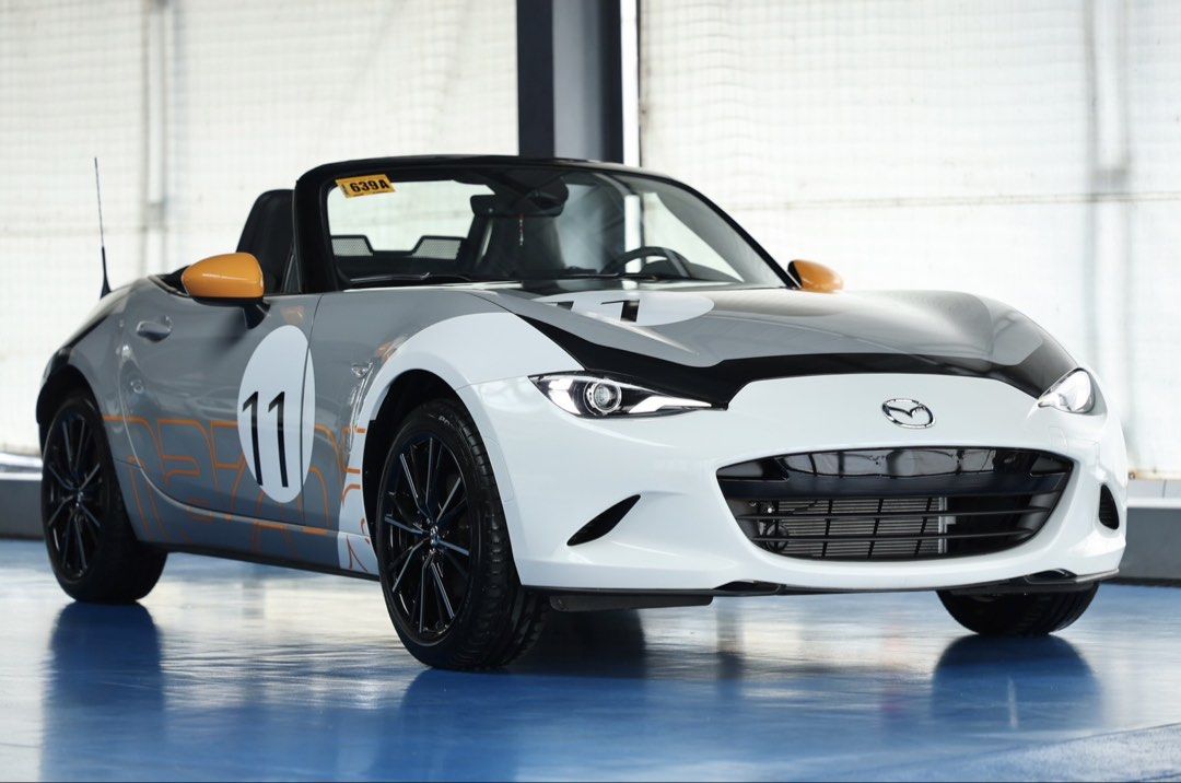 Mazda MX-5 Auto (Category: Used Cars) located in Quezon City. Submitted by marcars_trading (Listing ID 1467238845, Image 2). Description: 2024 Mazda MX-5 Limited Series Miata Cup 23rd Anniversary Edition 1.970M (neg) trade in ok 200 KMS ONLY Guaranteed IMMACULATE & BRANDNEW CONDITION This is the LIMITED EDITION of Miata MX5 by Mazda Philippines, there are only 23 units made & released in the Philippine market. This unit is badge numbered 11 from 