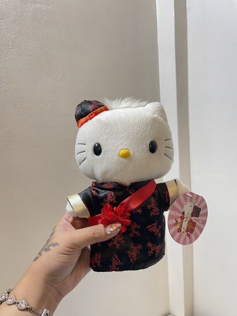 McDonald's Hello Kitty Chinese Wedding Plush Set (Category: Plushies & Soft Toys) located in Iba. Submitted by wealtheallymari99 (Listing ID 1467269247, Image 2). Description: - Official McDonald's Kitty Chinese Wedding plush doll set - Includes Groom in black traditional attire and Bride in red traditional dress and crown - Original round paper tags still attached - Clean fabric with vibrant, bright colors - Ideal collector's item for Kitty fans