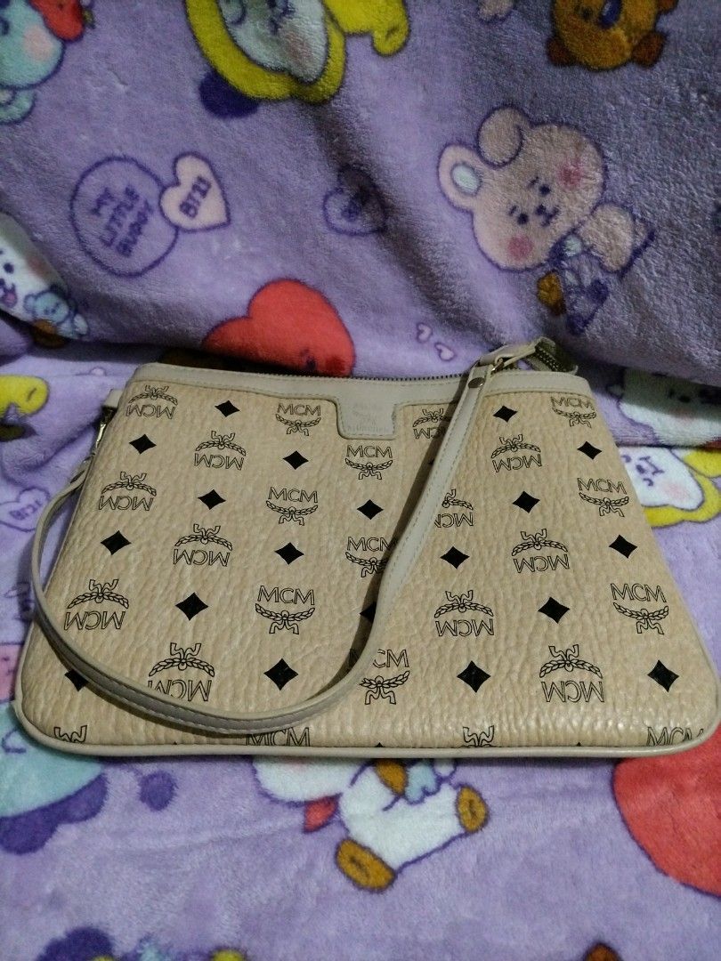 MCM Visetos Monogram (Category: Luxury Bags & Wallets) located in Valenzuela. Submitted by nurzdara28 (Listing ID 1467256888, Image 3). Description: MCM Visetos monogram crossbody pouch / shoulder bag with a top zip closure and matching strap. Lalamove ready..