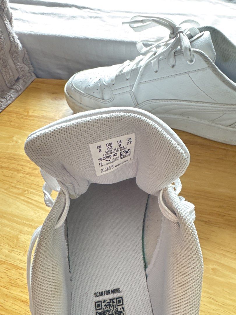 Men Puma White Sneakers Size US 9 (Category: Sneakers) located in Mandaluyong City. Submitted by uol77 (Listing ID 1467173983, Image 3). Description: - Brand/Model: Puma Low-Top Sneakers - Style: Classic court style with perforated toe box - Color: White (includes white laces and rubber soles) - Size: US 9 / EUR 42 / UK 8 - Condition: Minor scuffs on soles and upper from normal wear, still plenty of life left - Deal: Ready to ship, perfect for da
