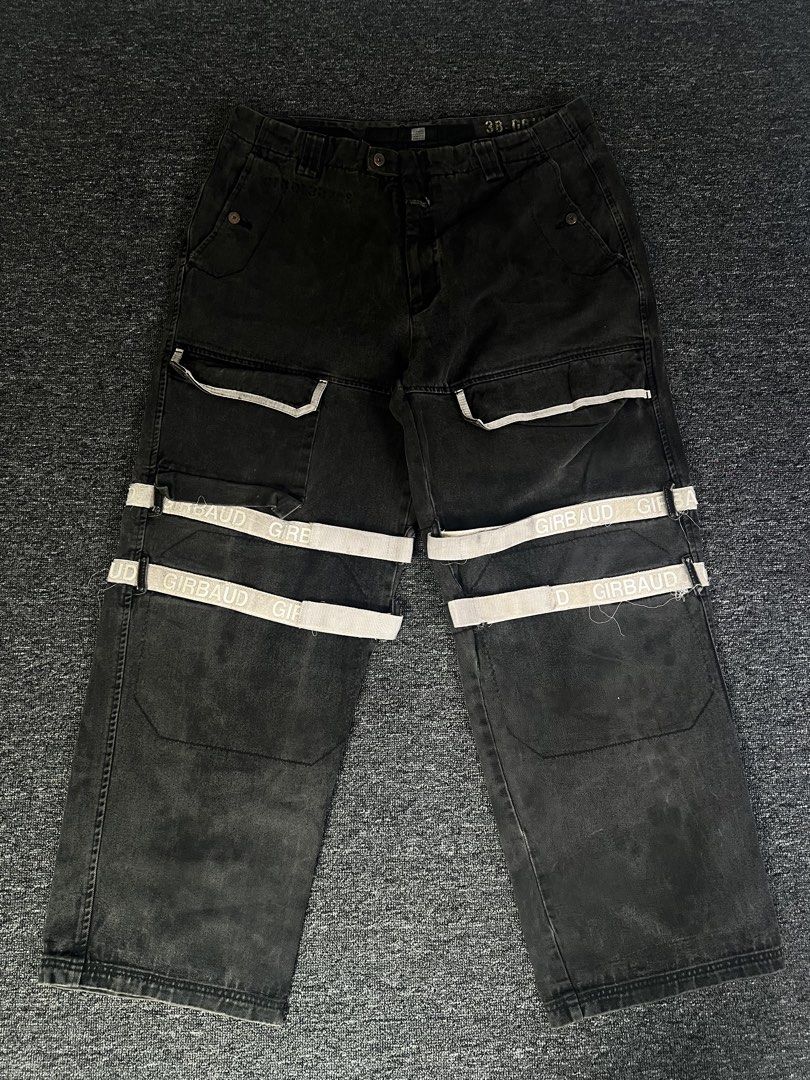 MFG Shuttle Strap Pants (Category: Jeans) located in Manila. Submitted by thrifty.4pp4rels (Listing ID 1467310623, Image 1). Description: Shipping fee shouldered by the buyer Issues: Distressed hem 8.5/10 color rate Measurements: W 42 L 45 Thigh 16 Hem 11.