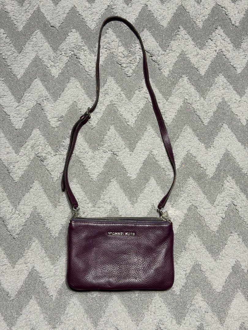 Michael Kors - Plum Trio Leather Bag (Category: Cross-body Bags) located in Cavite. Submitted by commoncourtesy (Listing ID 1467344703, Image 1). Description: Authentic.