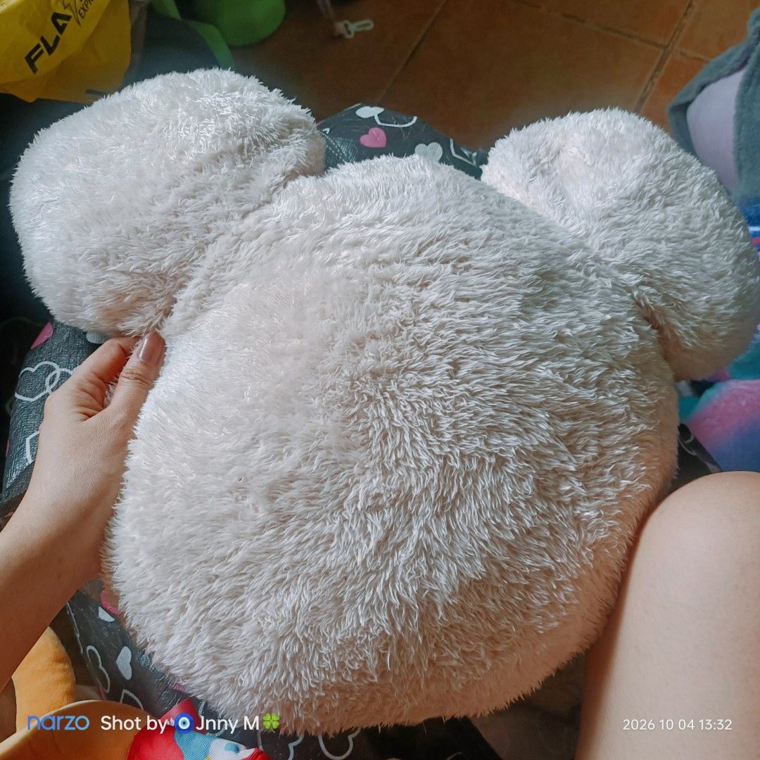Mickey Mouse Plush Pillow Cushion White (Category: Plushies & Soft Toys) located in Taguig. Submitted by mhayestufftoys (Listing ID 1467352753, Image 2). Description: - Design: Adorable Mickey Mouse shape in fluffy white - Condition: Brand new with tag attached (includes care instructions) - Size: Approximately 45cm x 37cm - Material: 100% super soft polyester fabric - Uses: Great for room decor, cuddling, or lounging.
