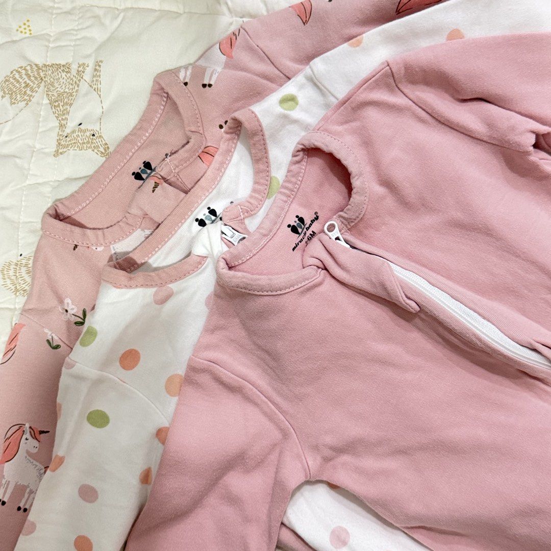 Miracle Baby 3-6M Pink Rompers Bundle (Category: Babies & Kids Fashion) located in Paranaque City. Submitted by yuffie__ (Listing ID 1467194874, Image 2). Description: - Brand: Miracle Baby - Size: 3 to 6 months - Quantity: Bundle of 3 adorable rompers - Designs: Solid pink, polka dot, and cute unicorn graphics - Features: Long sleeves, enclosed feet to keep toes warm, and full zip front for quick diaper changes - Material: Soft, breathable cotto