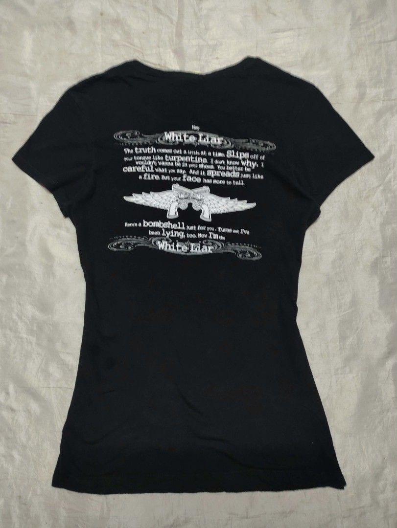 Miranda Lambert White Liar Graphic T-Shirt (Category: Shirts) located in Binan City. Submitted by myks_thrift (Listing ID 1467358949, Image 2). Description: - Official Miranda Lambert White Liar tour merchandise - Color: Black short sleeve top - Graphic print on front with lyrics on the back - Size: Medium (Slim fit cut) - Material: 100% combed cotton (Kavio brand tag) - Care: Machine washable - Made in Vietnam.