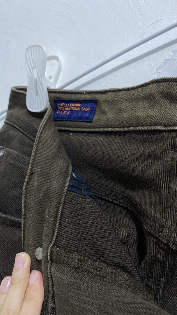 Miss Edwin International Basic Flex Olive Green Jeans 26 (Category: Jeans) located in Ozamiz City. Submitted by icadls (Listing ID 1467215009, Image 3). Description: - Brand: Miss Edwin - Color: Olive Green - Size: 26 - Fit: Classic flare cut - Material: Flex stretch fabric for ultimate comfort - Features: Zip fly with button closure, two front pockets, two back pockets - Condition: Clean with no major flaws - Perfect everyday wardrobe staple.