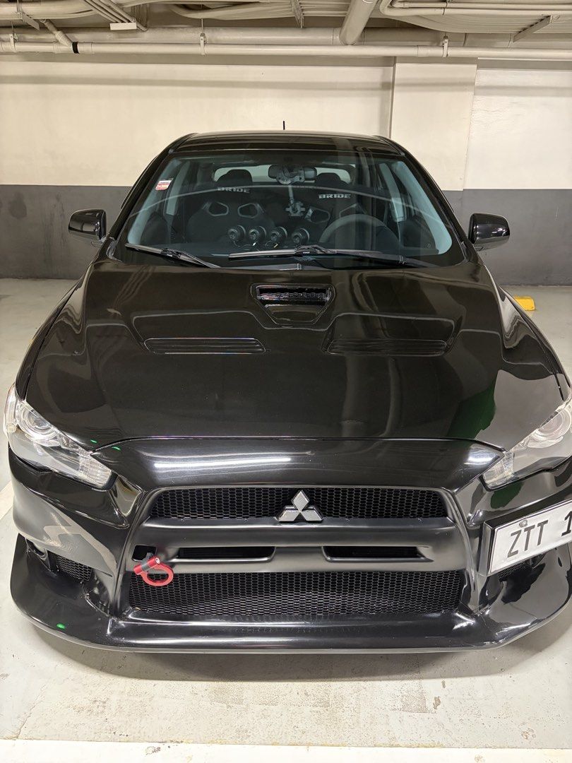 Mitsubishi Lancer 2.0 EX GT MIVEC 5MT Auto (Category: Used Cars) located in Las Pinas. Submitted by paulbp (Listing ID 1467326905, Image 2). Description: Mitsubishi Lancer EX 2.0 CVT Paddle shifters 18 inch Mags original Enkei Raijin with bridgestone tires Evo body kits stage 21 Carbon fiber hood painted black K & N filters Bride racing seats Ceramic coated by Aegis detailing .