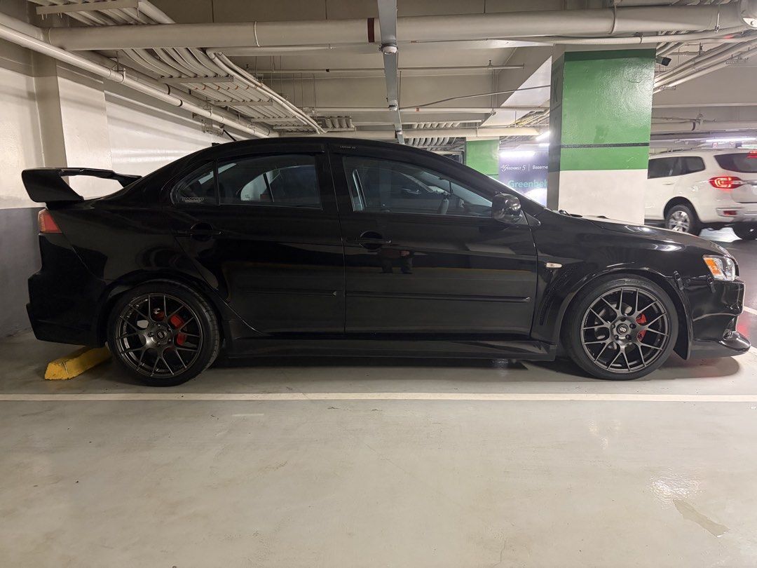 Mitsubishi Lancer 2.0 EX GT MIVEC 5MT Auto (Category: Used Cars) located in Las Pinas. Submitted by paulbp (Listing ID 1467326905, Image 3). Description: Mitsubishi Lancer EX 2.0 CVT Paddle shifters 18 inch Mags original Enkei Raijin with bridgestone tires Evo body kits stage 21 Carbon fiber hood painted black K & N filters Bride racing seats Ceramic coated by Aegis detailing .