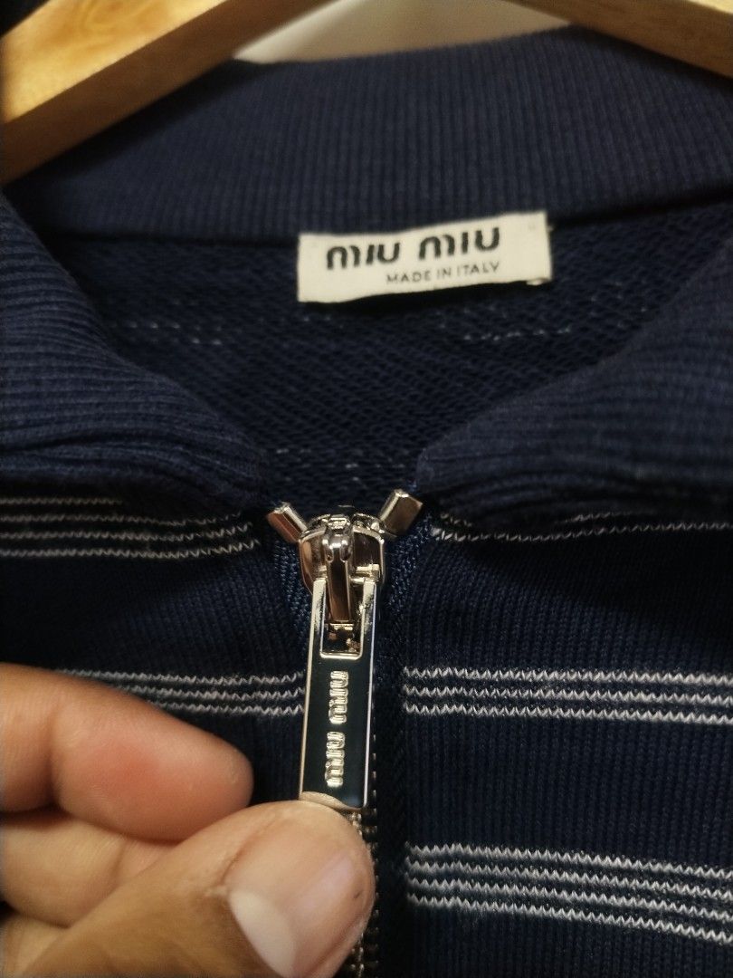 MIU MIU HALF ZIP STRIPE (Category: Coats, Jackets and Outerwear) located in Manila. Submitted by liljhayvillanueva (Listing ID 1467315622, Image 3). Description: MIU MIU HALFZIP STRIPE SIZE SMALL ON TAG /BEST FIT MEDIUM LARGE DIMES 22/28 COLORATE 9.5/10 ISSUE X.