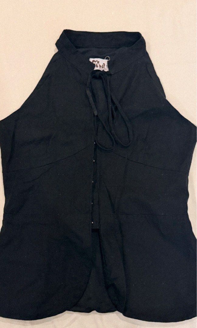 miu the label sol top (Category: Sleeveless) located in Manila. Submitted by strawberrybingsu006 (Listing ID 1467216855, Image 1). Description: - worn a few times - still in good condition - easy to style and match mod: jnt mop: gcash.