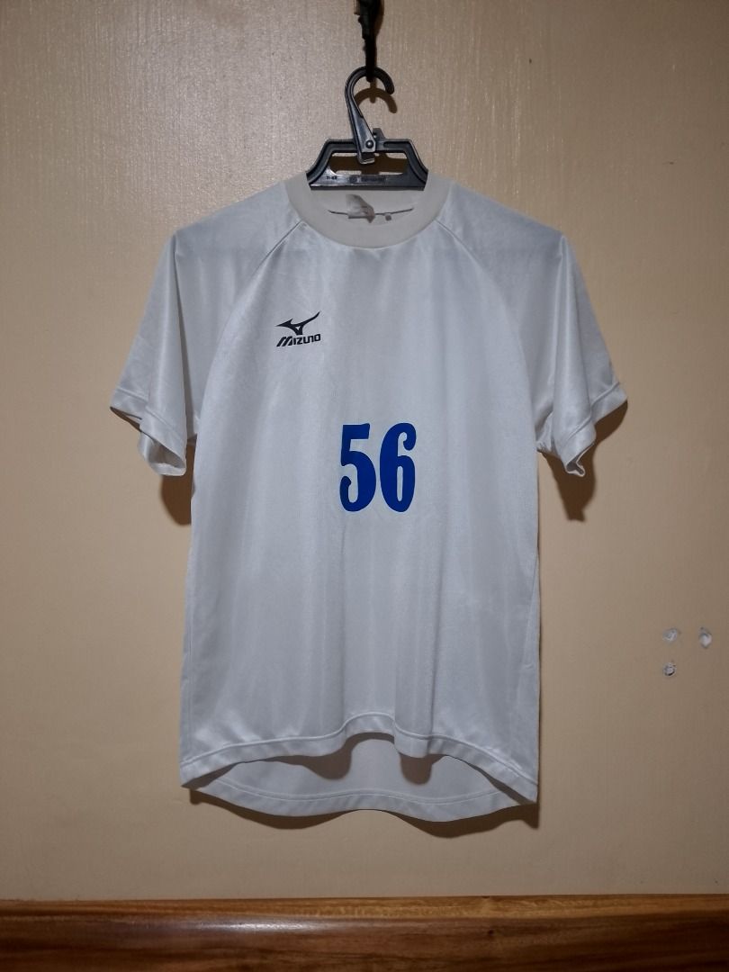 Mizuno White Jersey (Category: Activewear) located in Bayombong. Submitted by daily10 (Listing ID 1467362313, Image 1). Description: - Brand: Mizuno - Color: White with bold blue number 56 on front and back - Size: S (JASPO tag) - Dimensions: 19.5" x 26f" x 28b - Material: Lightweight, breathable athletic fabric - Design: Short sleeves and classic round collar -All Items are thrifted/preloved. Please manage your expectation -Payment First -No Ret