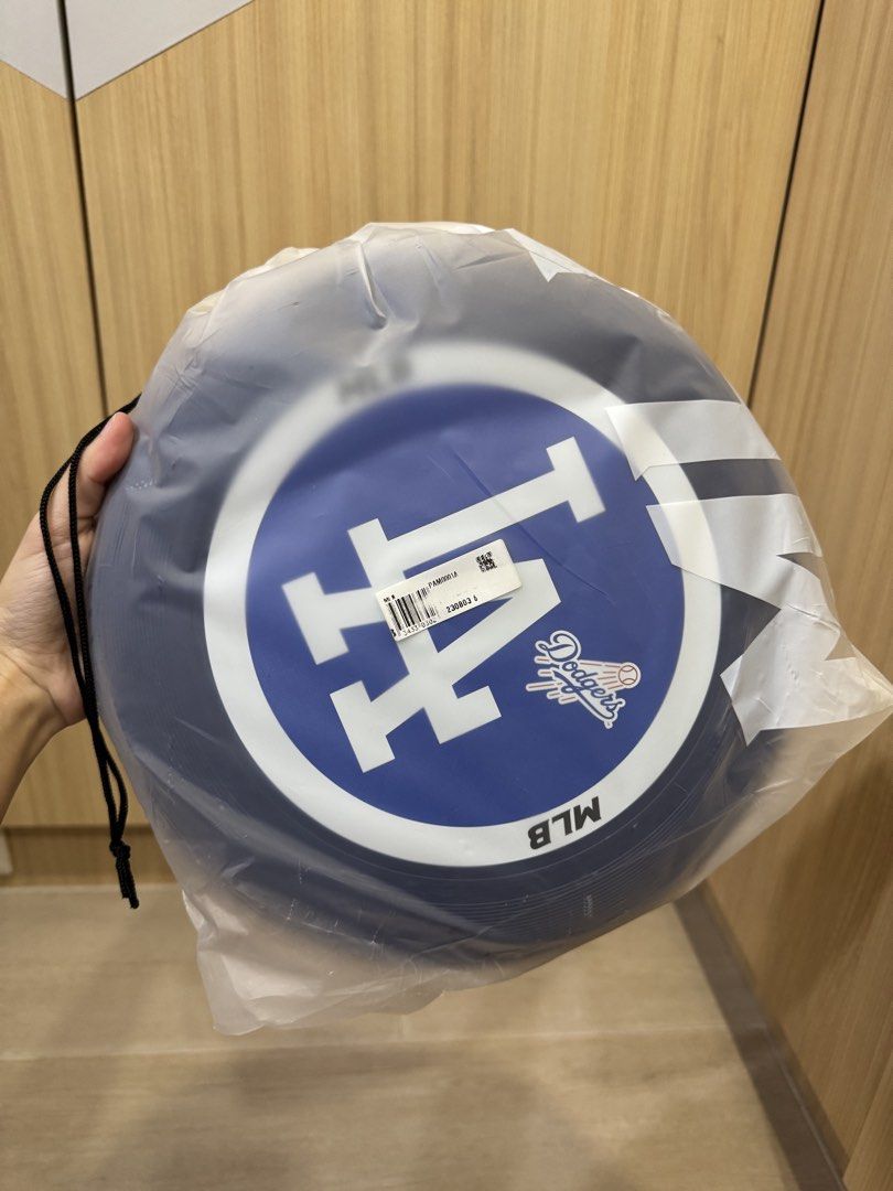 MLB Los Angeles Dodgers Frisbee (Category: Other Sports Equipment and Supplies) located in Taguig. Submitted by chinitafinds (Listing ID 1467258760, Image 2). Description: - Official MLB merchandise: Los Angeles Dodgers flying disc - Color: Dark blue with classic white LA logo - Condition: Brand new, enclosed in original clear drawstring carrying bag - Includes original barcode sticker - Perfect for Dodgers fans, outdoor games, park days, or as a