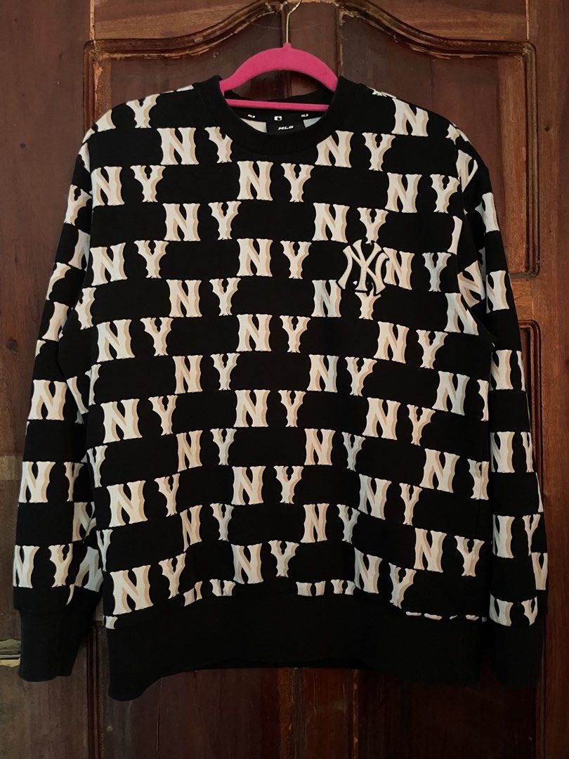 MLB New York Yankees Monogram Black Sweatshirt (Category: Coats, Jackets and Outerwear) located in Davao. Submitted by vin.my (Listing ID 1467203088, Image 1). Description: MLB New York Yankees black sweatshirt. All-over NY monogram print with embroidered team logo patch on the chest. Ribbed cuffs, collar, and hem. Official genuine merchandise tag attached inside. Cotton blend material, warm and comfortable for daily streetwear styling..