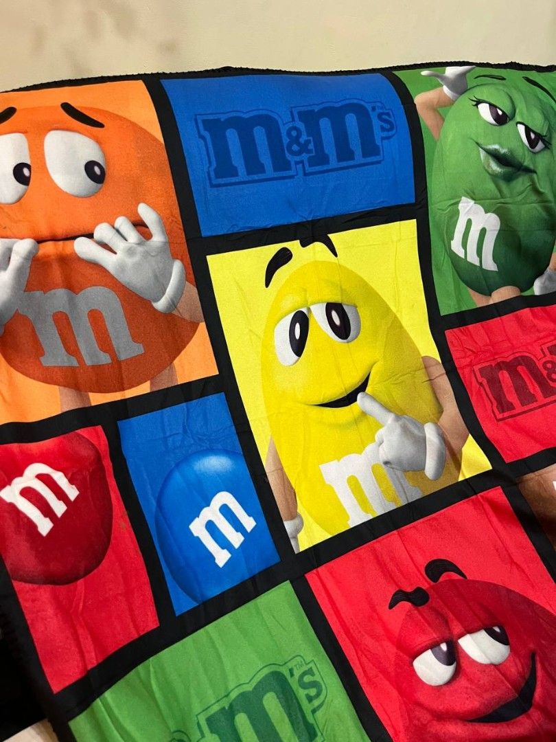 M&M's World Character Fleece Throw Blanket (Category: Other Merchandise) located in Quezon City. Submitted by michypeachyy1 (Listing ID 1467340990, Image 2). Description: 1000 plus shipping good as new.