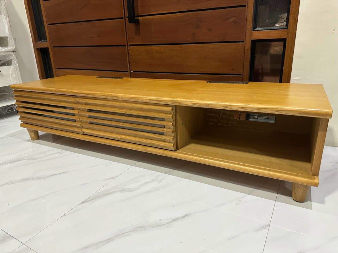 MODERN TV STAND ‼️ (Category: Announcements) located in Manila. Submitted by nanzkie_2015 (Listing ID 1467293964, Image 2). Description: Modern TV Stand *solid ash wood *storage with 2 sliding doors and drawer *good as new W60in x D16.5in x H13in.