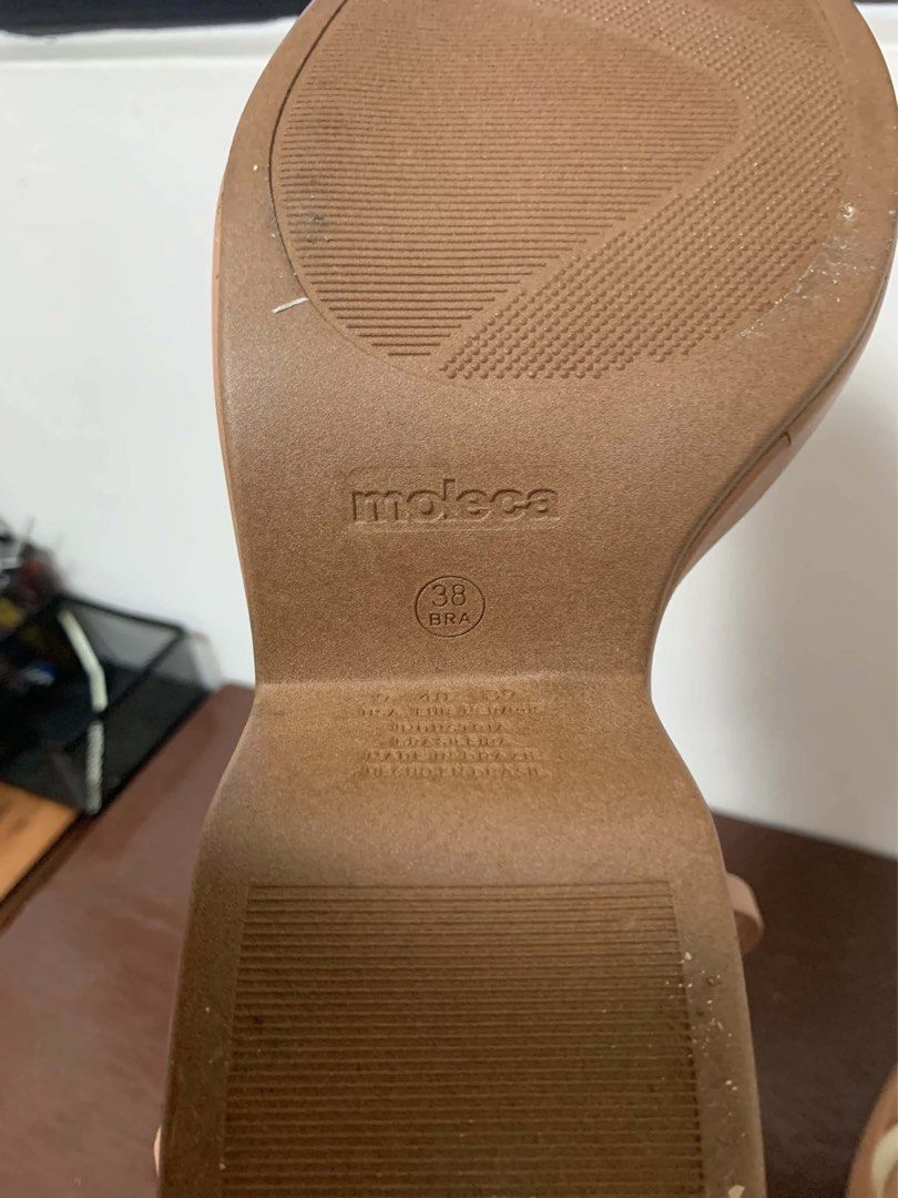 Beige Wedge Sandals Size 10W (wide) (Category: Wedges) located in Borongan. Submitted by kabes_jane (Listing ID 1467188496, Image 2). Description: - Brand: Moleca - Color: Nude beige with a contrasting cream stripe - Style: Two-strap front design with an elasticized slingback strap for easy slip-on - Heel: Comfortable chunky platform wedge for extra height - Details: Branded Moleca logo stamped on the insoles.