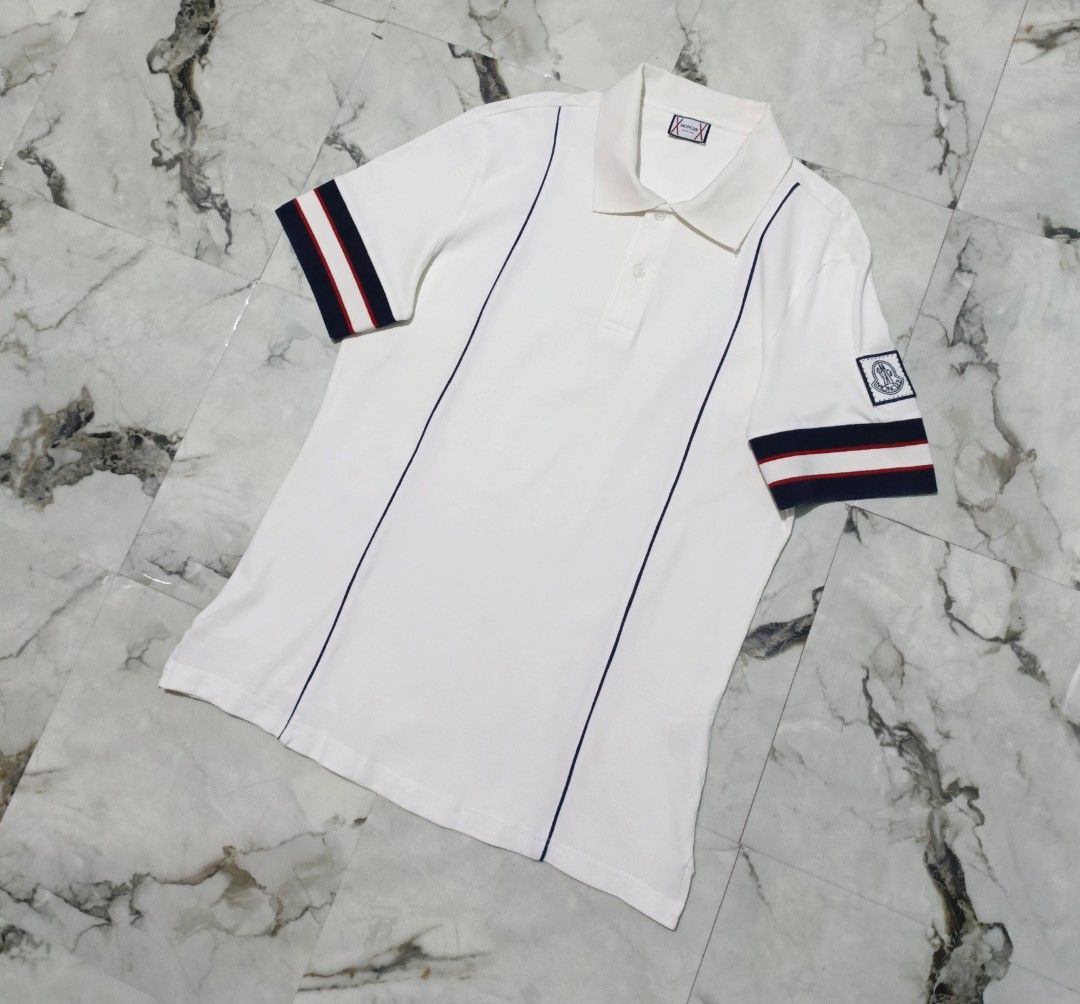 Moncler Polo Shirt (Category: Luxury Apparel) located in Bacolod City. Submitted by luxtrend.ph (Listing ID 1467186142, Image 2). Description: Moncler Polo Shirt •Photos may vary due to lighting✨ •For Men •Size: Small to Medium best fit •Measurements: 20W / 27.5L •Condition: Excellent •Issues: None •Color Rate: 9.5/10 •Complete tags •Embroidered patch logo •₱rice: 1,880 shipped🏷 DM to purchase🛒🛒🛒 Courier: J&T Express MOP: Gcash / Bank Transfe