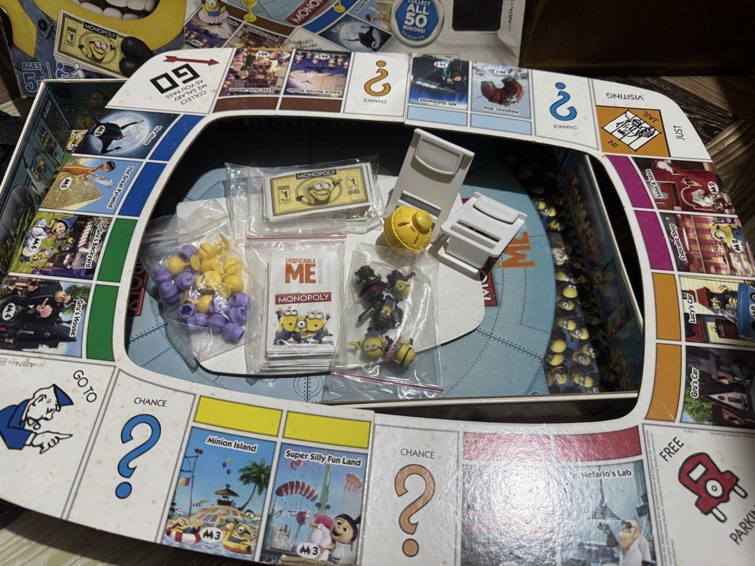 Monopoly Despicable Me Minion Made Board Game (Category: Board Games & Puzzles) located in San Pedro. Submitted by pageturner19 (Listing ID 1467176514, Image 3). Description: - Game: Monopoly Junior Despicable Me Minions Edition - Players: 2 to 4 players - Recommended Age: 5 years and up - Inclusions: Minion tokens, spinner pod, Monopoly money, property cards, chance cards, and game pieces - Condition: Complete contents neatly packed in original 