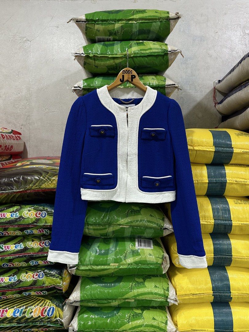 Moschino Cardigan (Category: Others Tops) located in Baliuag. Submitted by thrift.king.ph (Listing ID 1467354418, Image 1). Description: Moschino Cardigan Excellent condition Width: 16-17 Length: 16.5.