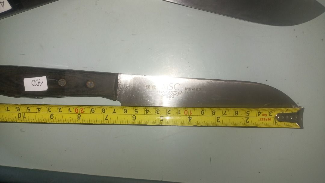MSC MS-400 Stainless Steel Kitchen Knife (Category: Knives & Chopping Boards) located in Munoz. Submitted by larryc1212 (Listing ID 1467317835, Image 2). Description: - Brand: MSC (Model MS-400) - Blade: Sharp stainless steel, approx. 162 mm - Total Length: Approx. 288 mm - Handle: Dark riveted wooden handle with solid grip Disclaimer: Item may include some scratches due to age, as is were is basis Item can be pick up in our Japan surplus shop lo