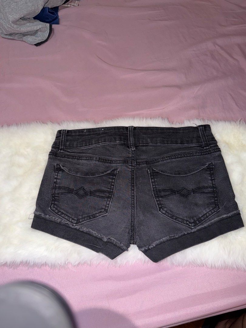 Mudd Black Denim Cuffed Shorts (Category: Shorts) located in Manila. Submitted by maureenn10 (Listing ID 1467196995, Image 2). Description: - Brand: Mudd - Color: Classic black wash - Fit: Mid-rise waist with double button closure - Design: 5-pocket style with decorative stitching on back pockets - Details: Trendy raw hem with cuffs.