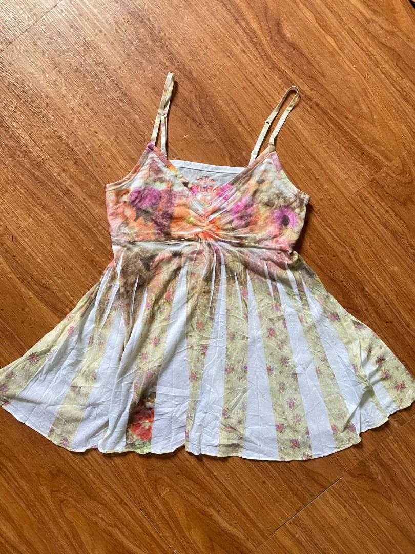 Mudd Floral Tie-Dye Cami Tank Top (Category: Sleeveless) located in Malasiqui. Submitted by finnley26 (Listing ID 1467239144, Image 2). Description: - Brand: Mudd - Style: V-neck cami top with adjustable straps and gathered center detail - Design: Flowy flared hem with alternate panels of white fabric and vintage floral tie-dye (yellow, orange, and pink hues) - Fabric: Super lightweight material - Best for: Summer days or easy layering - Conditio