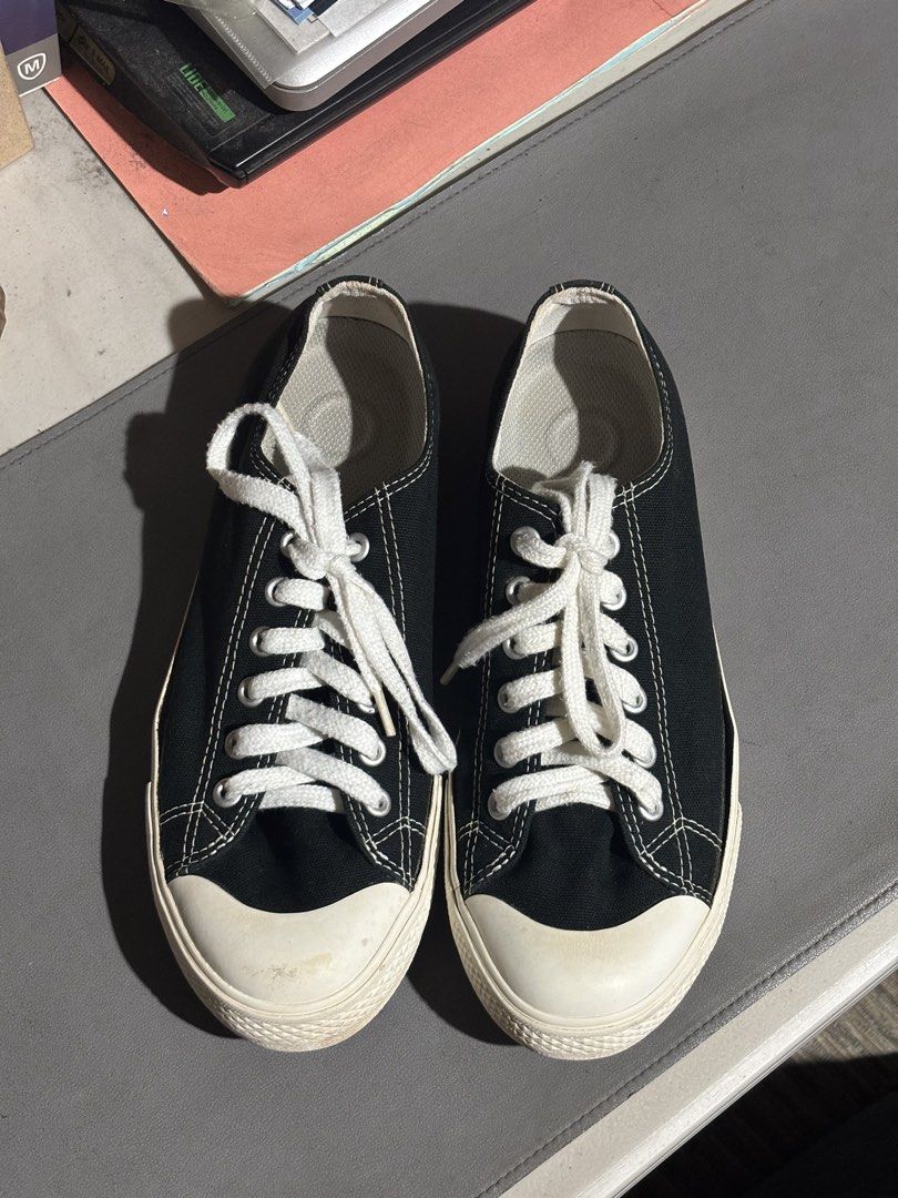MUJI Black Canvas Low-Top Sneakers (Category: Sneakers) located in Manila. Submitted by andy031602 (Listing ID 1467324853, Image 2). Description: - Style: Classic black canvas low-top sneakers - Design: Contrast white stitching with white laces and thick white rubber soles - Look: Clean and versatile for casual everyday outfits - Fit: Comfortable for all-day daily wear.