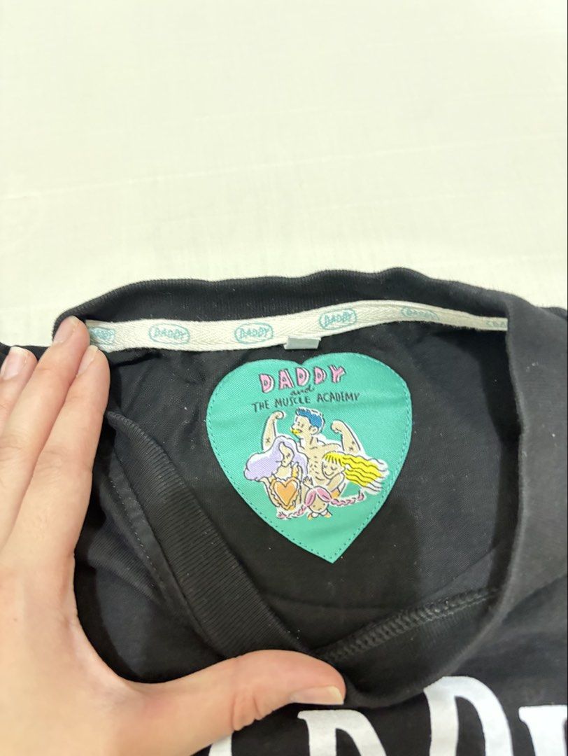 Muscle tee (Category: Shirts) located in Mandaluyong City. Submitted by beas_closet (Listing ID 1467321082, Image 2). Description: Daddy & the muscle academy shirt.