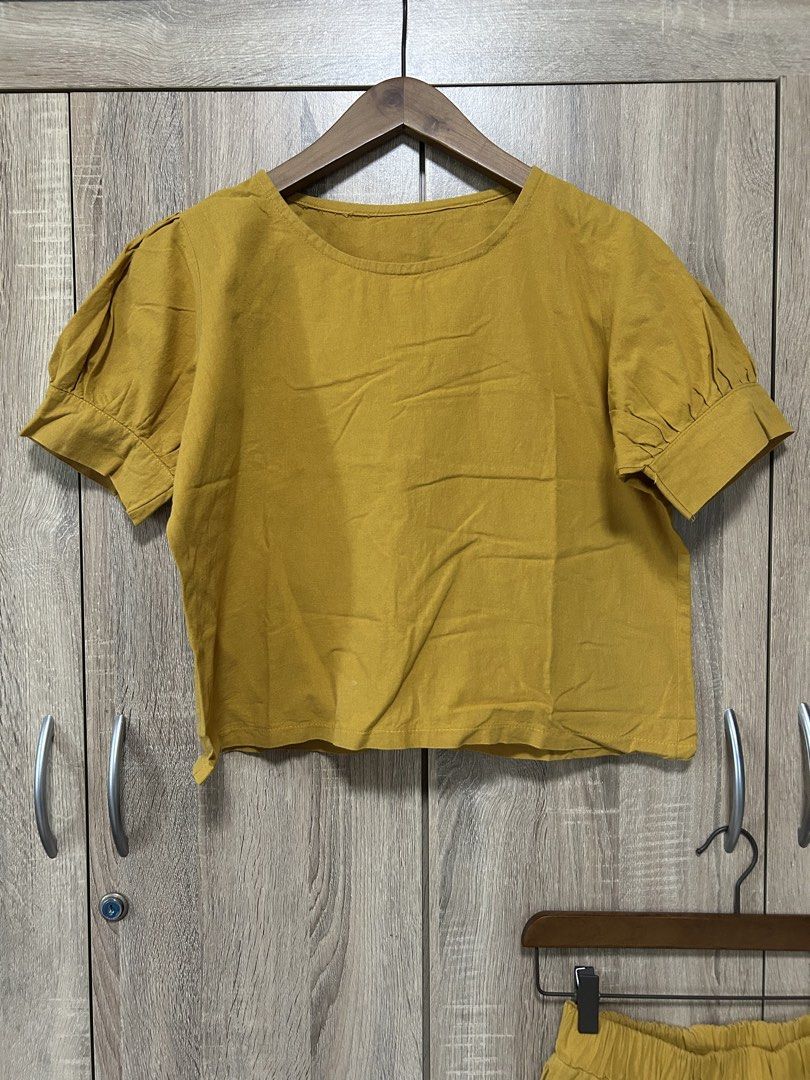 Mustard Yellow Co-ord Set (Category: Sets or Coordinates) located in Bulacan. Submitted by relove.re (Listing ID 1467308343, Image 2). Description: 💛 Mustard Yellow Co-ord Set for Sale! Chic and comfy two-piece set featuring a puff-sleeve crop top and matching shorts with an elastic waistband. Perfect for casual outings, travel, or everyday OOTD! ✨ Size Small ✔️ Matching top and shorts ✔️ Stylish puff sleeves ✔️ Comfortable elastic waistband ✔️ 