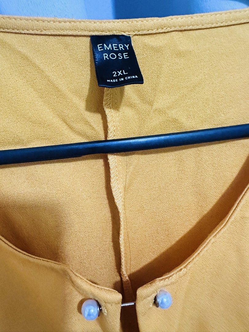 Mustard yellow Plus Size Blouse 2XL (Category: Blouses) located in Quezon City. Submitted by mananglinette (Listing ID 1467269189, Image 3). Description: - Brand: EMERY ROSE / shein - Size: 2XL - Color: yellow mustard - Sleeves: Short with gathered shoulder detail - Neckline: Keyhole with a chic pearl-like clasp - Fit: Relaxed, soft, and comfortable fabric - Best for: Workwear, casual outings, and everyday chic looks.