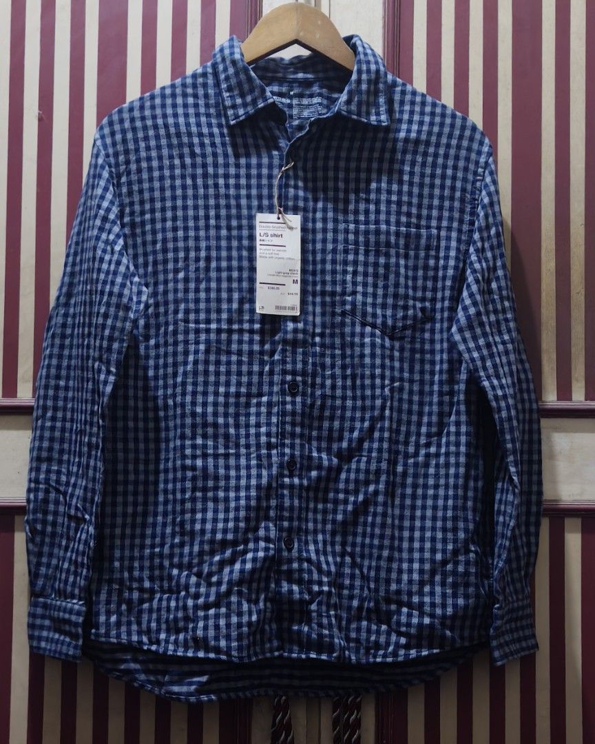 (M-XL) Muji NWT Blue Gingham Button Down Shirt (Category: Longsleeves) located in Quezon City. Submitted by ginghamgirlie (Listing ID 1467268640, Image 3). Description: SIZE ON TAG: M BEST FITS: M-XL MEASUREMENTS chest: 44 inches length: 31 inches 📌 PLEASE NOTE • Sizing is based on the actual measurements of the garment, not the tagged size. • Pre-owned pieces may differ from the tagged size due to stretching, shrinkage, wear, alterations, or la