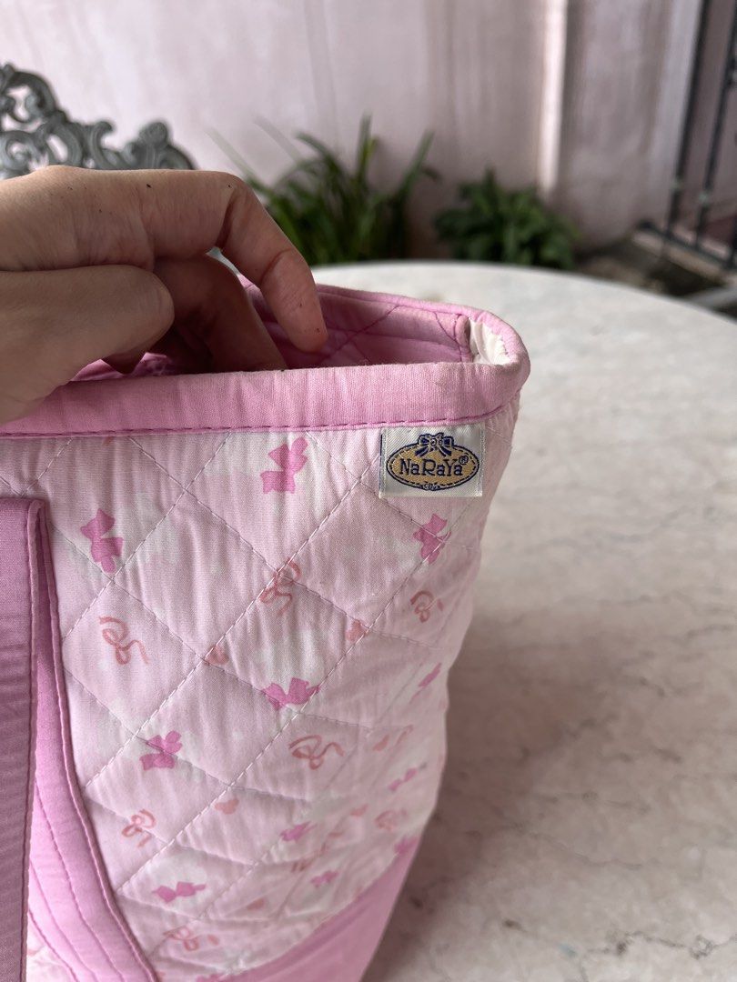 Naraya Pink Tote Bag (Category: Tote Bags) located in Las Pinas. Submitted by pastel_rewind_ph (Listing ID 1467188041, Image 2). Description: Naraya Pink Medium Tote Bag (last price posted) - Flaws: faded color on the edges and few parts of the body and stain at the bottom (needs washing) - 4 open pockets inside - Zipper Main Compartment .