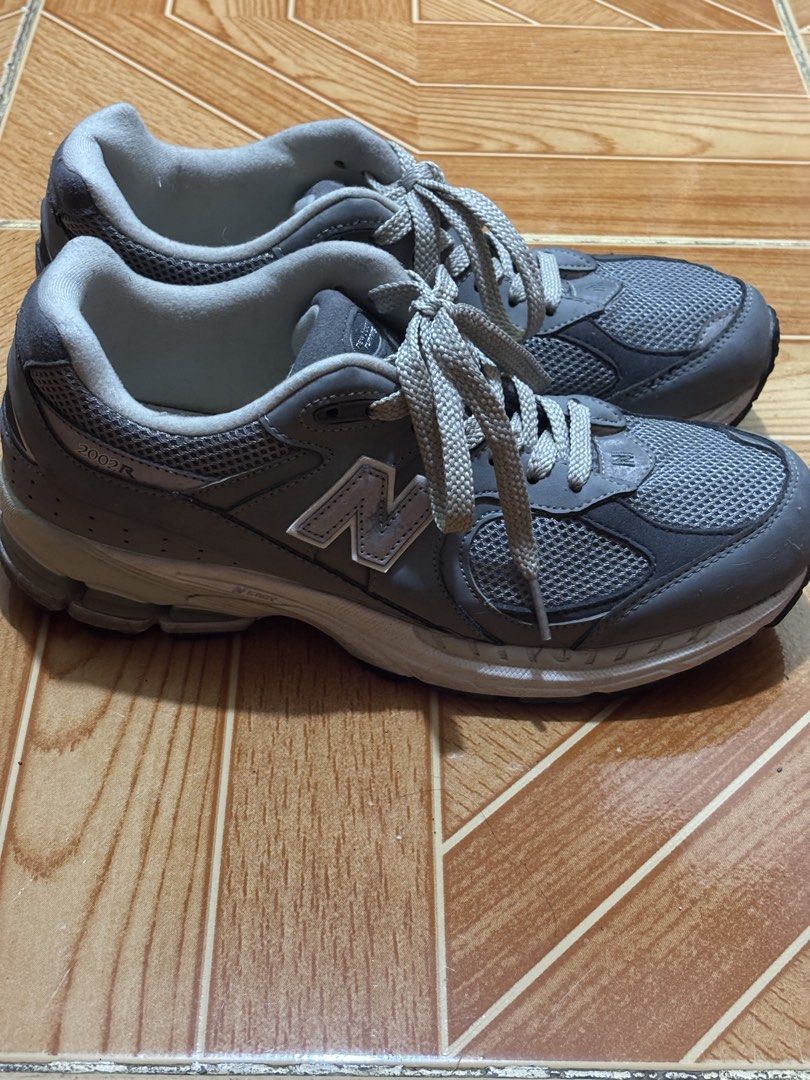 New Balance 2002R (Category: Sneakers) located in Manila. Submitted by saureus (Listing ID 1467229868, Image 1). Description: - Brand: New Balance - Model: 2002R (M2002RNM) - Color: Grey - Size: Men's US 7.5 / UK 7 / EU 40.5 (25.5 cm) - Material: Mesh and leather upper with lace-up front.