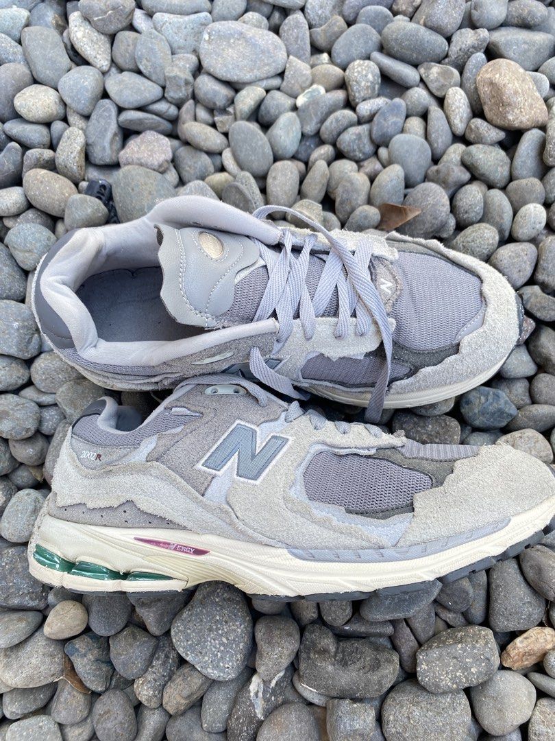 New Balance 2002R Protection Pack Rain Cloud Grey (Category: Sneakers) located in Las Pinas. Submitted by john.ross.sayoc.30-82096 (Listing ID 1467362339, Image 1). Description: - Model: New Balance 2002R - Colorway: Rain Cloud (Classic Grey) - Upper: Deconstructed suede overlays with raw edges and breathable mesh underlays - Sole: N-ERGY cushioning midsole with green gel pods and Stability web outsole - Condition: Worn with minimal tread wear on