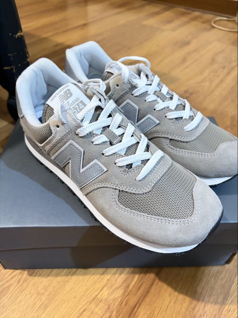 New Balance 574 (Category: Sneakers) located in Manila. Submitted by boldstorm_d9c8ce (Listing ID 1467249565, Image 1). Description: • Condition: 100% Brand New (Never worn) • Inclusions: Comes complete with the shoe box • Colorway: Grey White • Size: US MEN 8 1/2.
