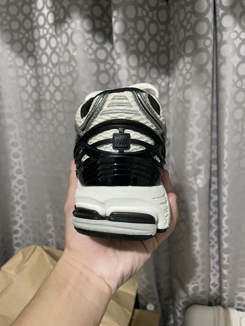 New Balance 9060R Silver Black (Category: Sneakers) located in Manila. Submitted by yebamonke (Listing ID 1467298643, Image 2). Description: - Brand: New Balance - Model: 1906R - Color: Silver, White, and Black - Size: EU 41.5 / UK 7.5 / US 8.5 - Condition: Like new, with original box - Features: N-Lock system, supportive cushioning, durable rubber outsole, and textured insoles - Delivery: Shipping / Lalamove available .