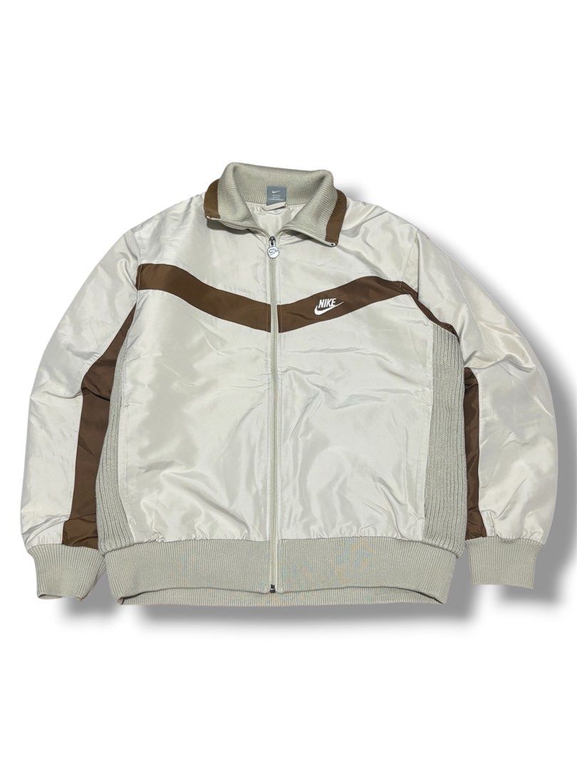 Nike 00's Brown Swoosh Wind Track Top (Category: Coats, Jackets and Outerwear) located in Manila. Submitted by sec_life.thrift (Listing ID 1467272145, Image 1). Description: Nike 00’s Brown Swoosh Wind Track Top Used once Size XL 9/10 Condition.