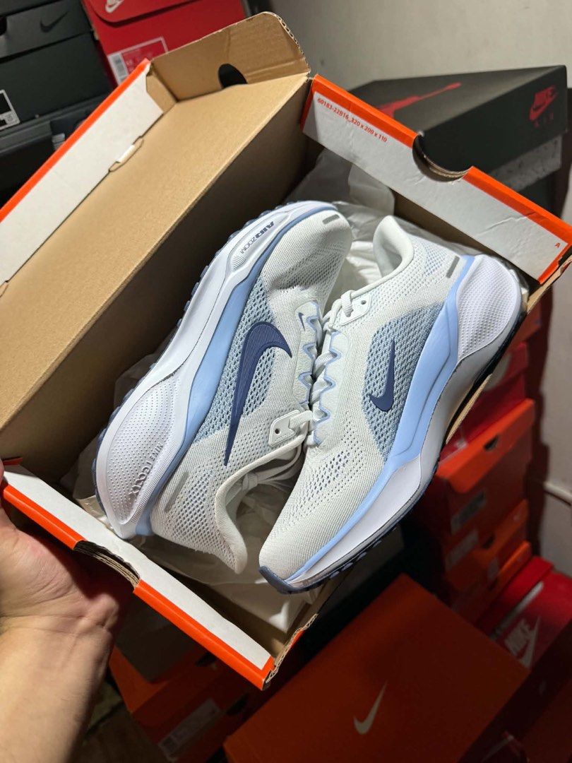 Nike Air Zoom Pegasus 41 (Category: Sneakers) located in Manila. Submitted by rmolde.0424 (Listing ID 1467262664, Image 1). Description: - Brand: Nike - Model/Tech: Air Zoom cushioning - Color: White and blue with iconic blue swoosh - Material: Breathable mesh upper - Condition: Brand new, unworn, fresh in original orange Nike shoebox - Mode of transaction: Shipping or meet-up available.