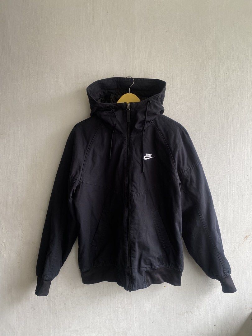 Nike Black Hooded Jacket Cotton Blend Size S (Category: Coats, Jackets and Outerwear) located in Manila. Submitted by anthony1723 (Listing ID 1467193836, Image 1). Description: - Brand: Nike - Color: Classic Black with White Embroidered Logo - Size: Small (Regular Fit) - Material: 100% Cotton body with polyester lining and fill - Features: Full zip-up front, adjustable drawstring hood, ribbed cuffs and hem to lock in warmth - Condition: Excellent