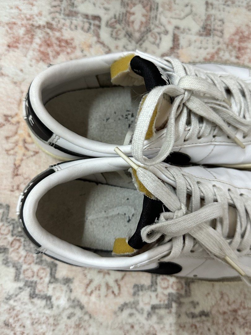 Nike Blazer Low '77 Vintage White Black (Category: Sneakers) located in Cebu City. Submitted by penelopetee (Listing ID 1467250614, Image 3). Description: - Colorway: White leather with black swoosh and grey suede overlays - Details: Yellow exposed foam tongue edge and white rubber midsoles with herringbone outsoles - Condition: Minor wear on soles and insoles from previous use - Inclusions: Comes with original white laces - DM for inquiries or f