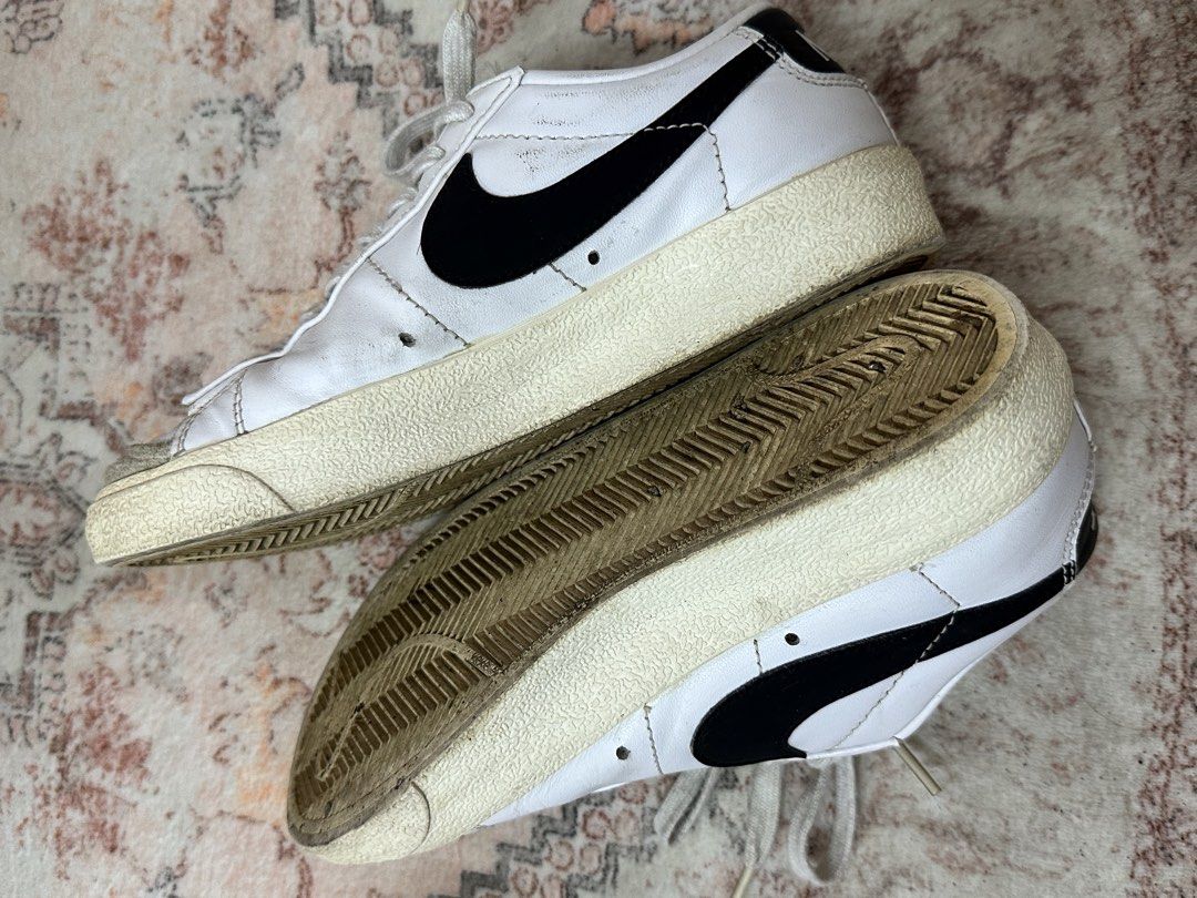 Nike Blazer Low '77 Vintage White Black (Category: Sneakers) located in Cebu City. Submitted by penelopetee (Listing ID 1467250614, Image 1). Description: - Colorway: White leather with black swoosh and grey suede overlays - Details: Yellow exposed foam tongue edge and white rubber midsoles with herringbone outsoles - Condition: Minor wear on soles and insoles from previous use - Inclusions: Comes with original white laces - DM for inquiries or f