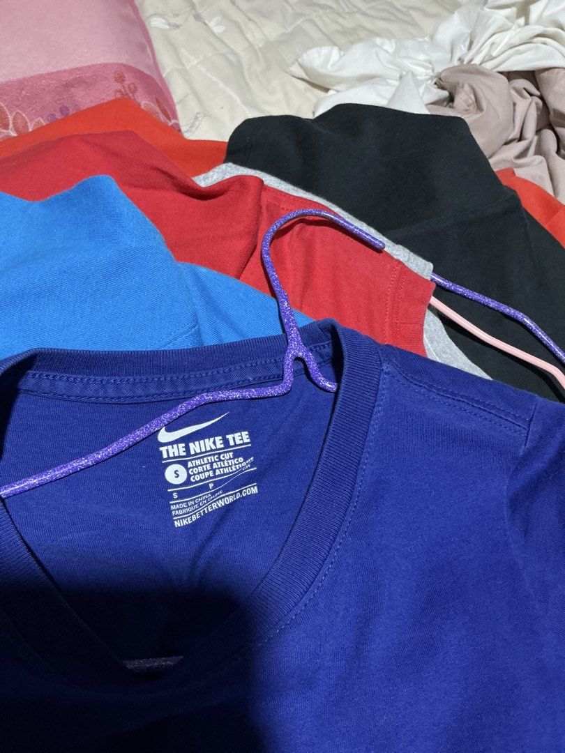 Nike Blue Athletic T-Shirt Size S (Category: Babies & Kids Fashion) located in Davao. Submitted by trendytreasuresest.2024 (Listing ID 1467302268, Image 2). Description: - Brand: Nike - Color: Blue - Size: S (Chest: 65cm) - Material: 100% Cotton - Design: Large logo print on front, short sleeves, round neck - Condition: Brand new/Great for casual daily wear - Origin: Made in China.