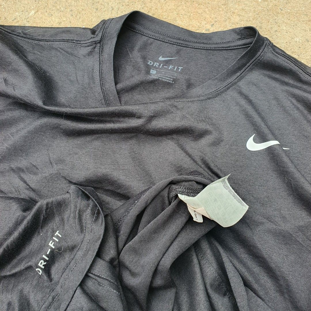 Nike Dri-Fit Athletic Long Sleeve Black Large (Category: Activewear) located in Cavite. Submitted by josephnl (Listing ID 1467350254, Image 2). Description: - Brand: Nike - Item: Athletic Long Sleeve Shirt - Color: Classic Black with Swoosh logo - Technology: Dri-Fit lightweight performance material - Neckline: Crew neck - Size: Large - Perfect for workouts, sports, or casual everyday wear.