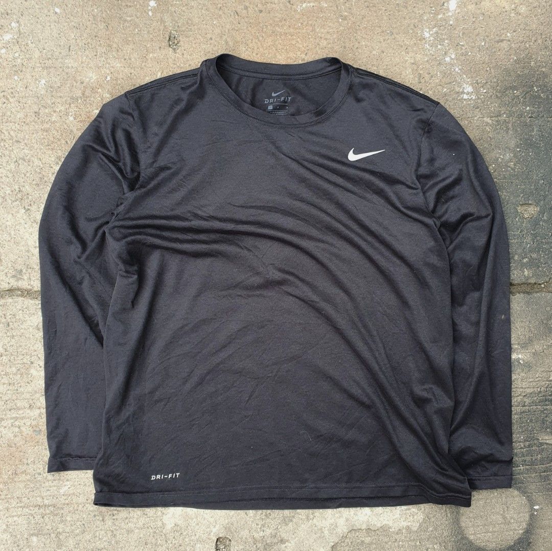 Nike Dri-Fit Athletic Long Sleeve Black Large (Category: Activewear) located in Cavite. Submitted by josephnl (Listing ID 1467350254, Image 1). Description: - Brand: Nike - Item: Athletic Long Sleeve Shirt - Color: Classic Black with Swoosh logo - Technology: Dri-Fit lightweight performance material - Neckline: Crew neck - Size: Large - Perfect for workouts, sports, or casual everyday wear.